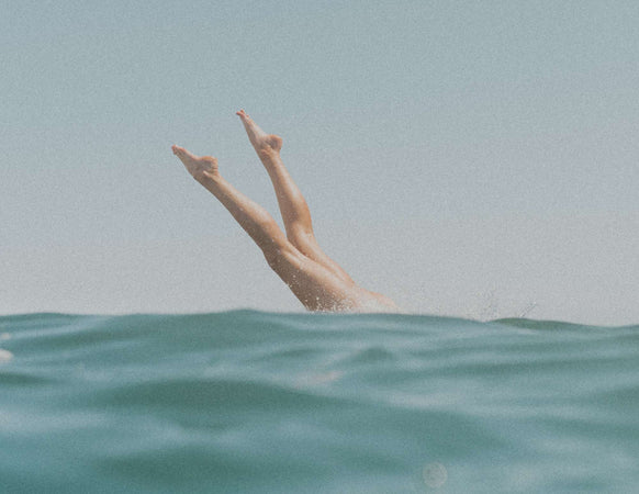 Gorgeous free stock photo of a woman diving into the ocean